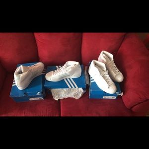 White and blue  hightop adidas